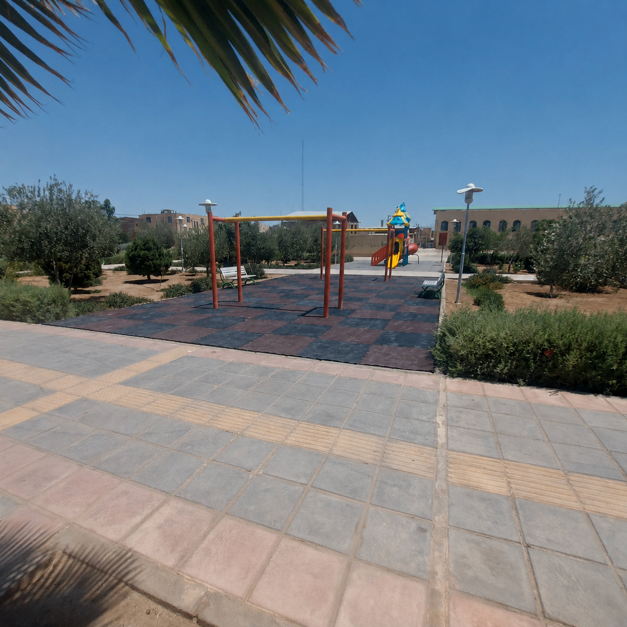The playground after the interlocking rubber granule flooring was installed